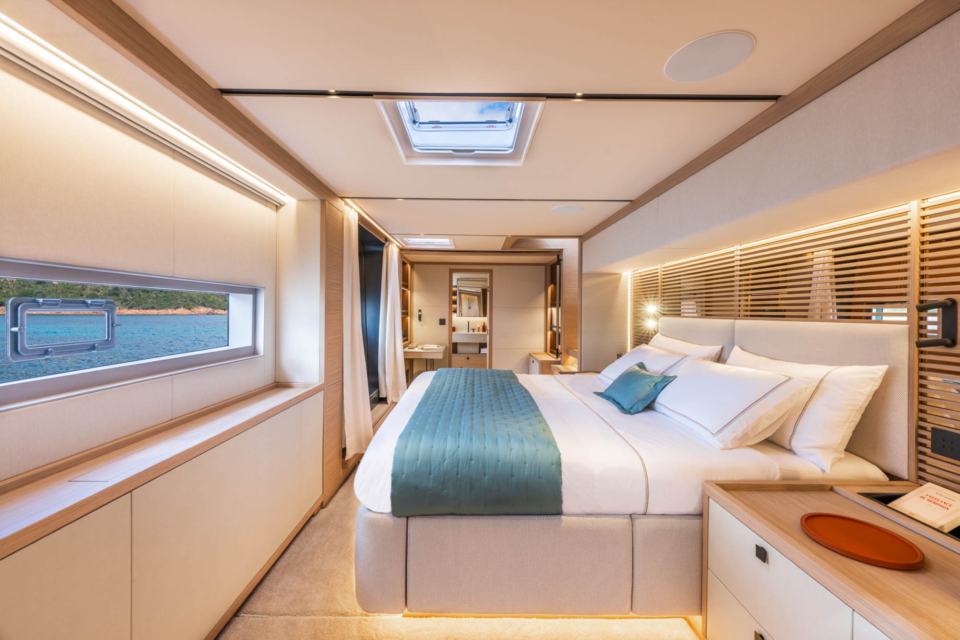 Owner suite of the Lagoon Eighty 2 with panoramic hull windows