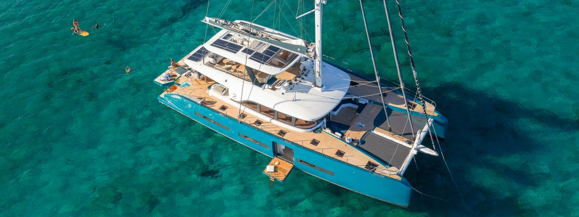 Lagoon Eighty 2 anchored in clear turquoise water